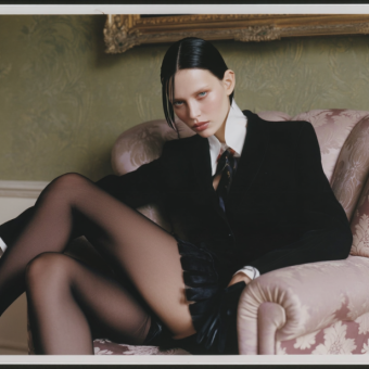 SilkJuly_A_woman_with_sleek_neatly_styled_dark_hair_is_sittin_d55d256c-10f0-4af3-a3b5-566027cbf2a1_0.png